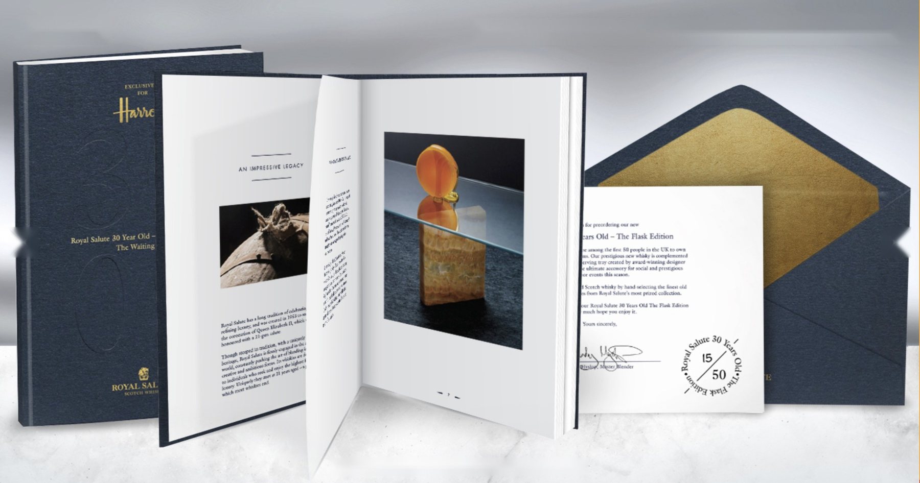 The Flask Edition launch book and invitation with a gold-lined envelope