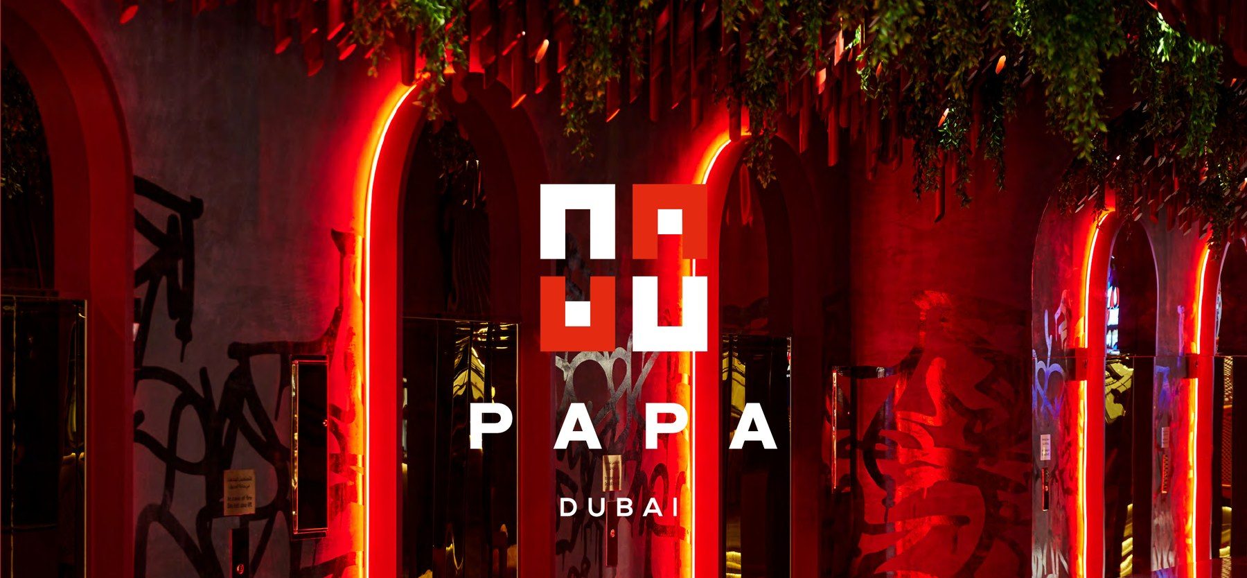 Papa Dubai entrance with neon arches and the Papa logo