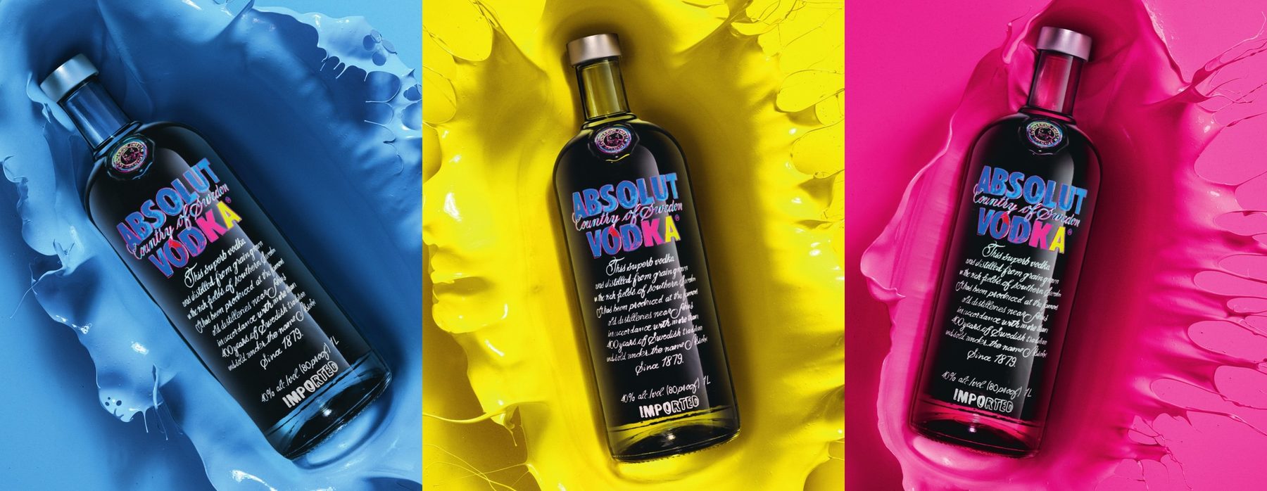 Absolut Warhol bottles in blue, yellow and pink paint splashes