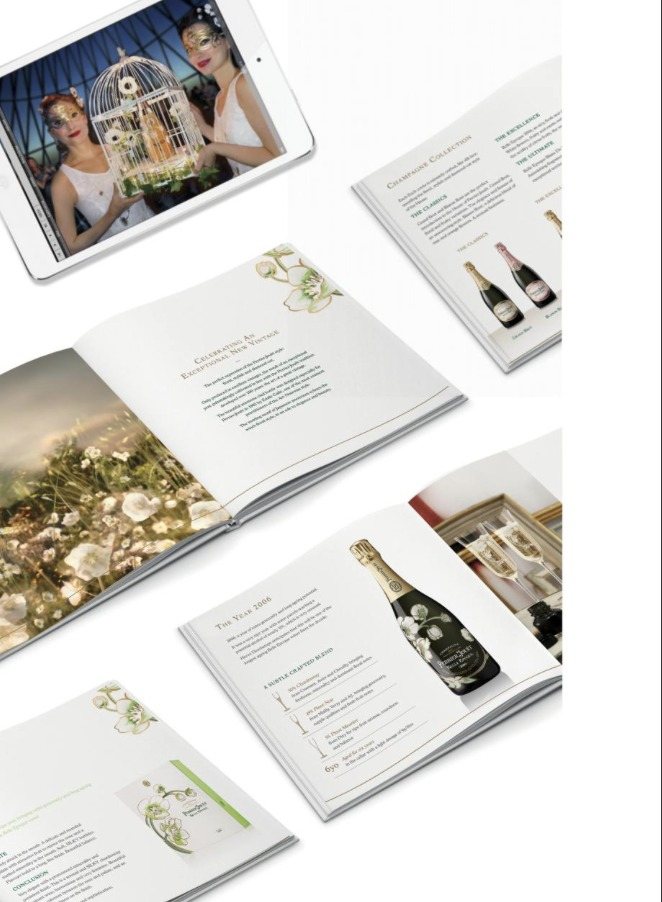 The birdcage serve on screen and the Celebrating an Exceptional New Vintage launch brochure