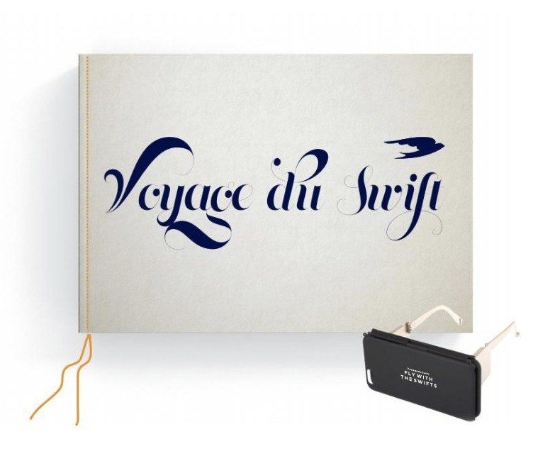 The hand-stitched Voyage du Swift book with the VR headset